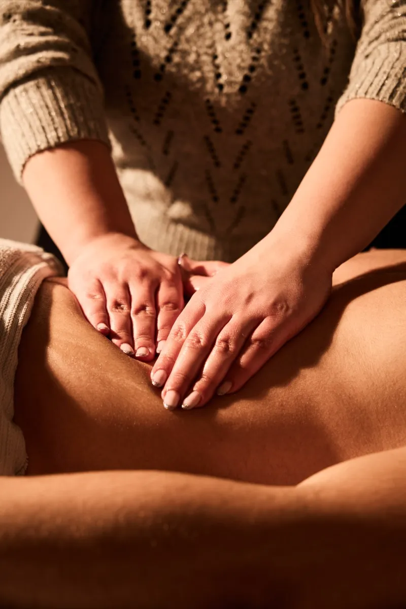 Lower back massage at Synergy Clinic